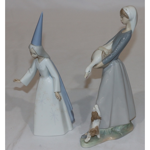 12 - A Lladro figure of a Sorceress (wand missing), 27.5cm high and a Lladro figure of a young lady holdi... 