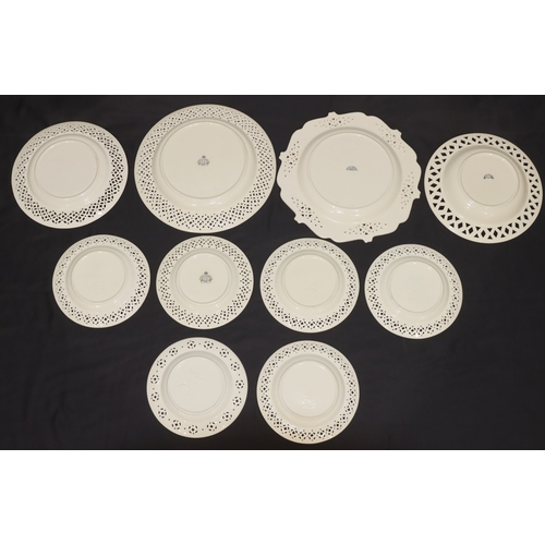 13 - A modern creamware selection of side plates and 4 various larger similar plates (10)