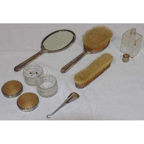 181 - A Mappin & Webb silver and champagne coloured enamelled dressing table set, comprising of hand mirro... 