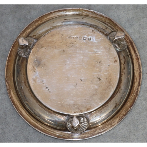 188 - A Birmingham silver small round wine coaster on splayed claw feet, 10cm diameter, 2.3oz