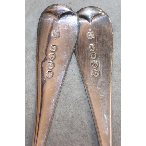 189 - A pair of Victorian tablespoons with later embossed gilt bowls with fruit decoration and engraved ha... 