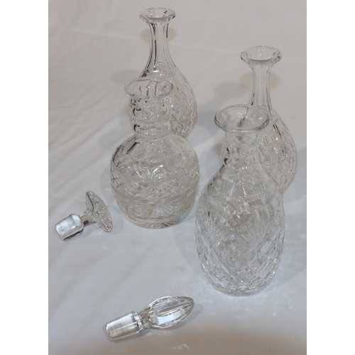 19 - A pair of cut glass round bulbous thin necked decanters with stoppers, 28.5cm high and 2 further hea... 