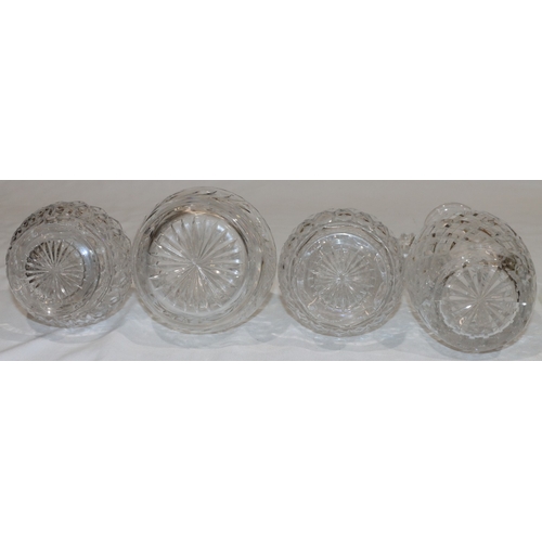 19 - A pair of cut glass round bulbous thin necked decanters with stoppers, 28.5cm high and 2 further hea... 