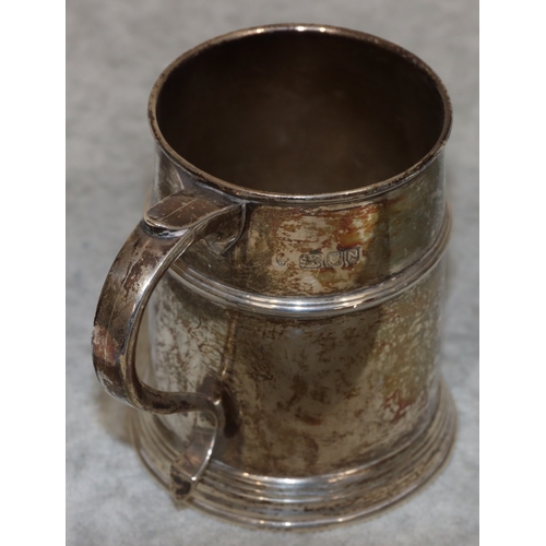 192 - A London silver christening mug with scroll handle, engraved presentation, 10cm high, 7.3oz