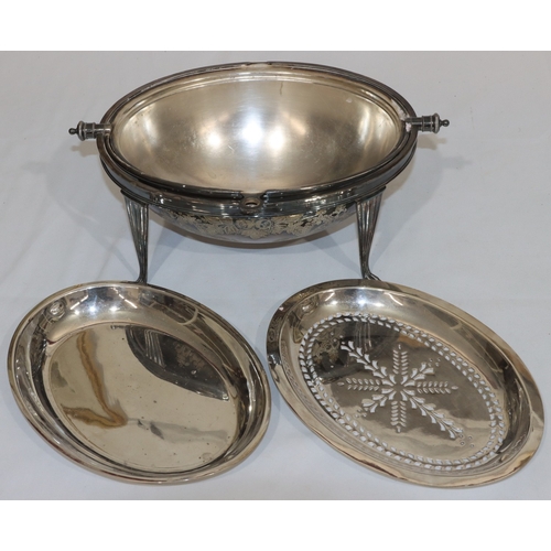 196 - A silver plated egg shaped breakfast dish with revolving sliding top with engraved floral decoration... 