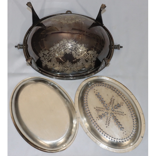 196 - A silver plated egg shaped breakfast dish with revolving sliding top with engraved floral decoration... 