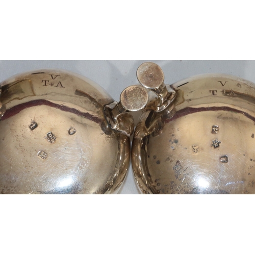 213 - A pair of early George III silver round bulbous shaped salts with crinkle rims with blue glass liner... 