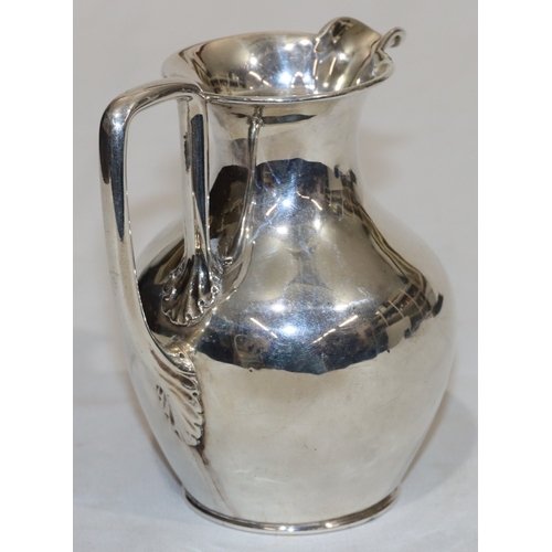 214 - An early Victorian silver round bulbous shaped milk jug, London 1844, maker's mark AA/JA, 12cm high,... 