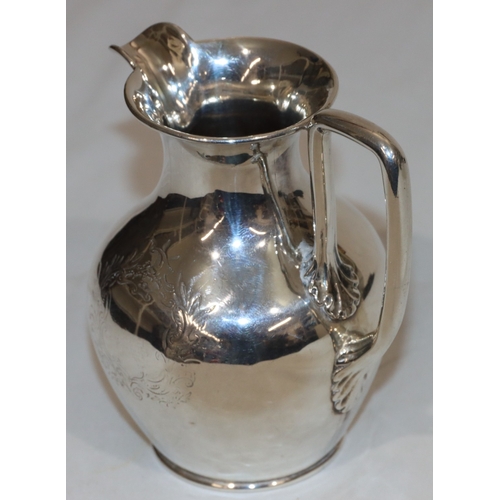 214 - An early Victorian silver round bulbous shaped milk jug, London 1844, maker's mark AA/JA, 12cm high,... 