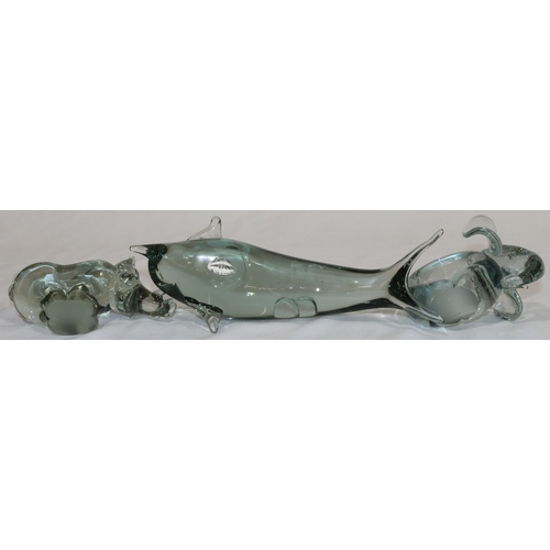 23 - An Ngwenya of Swaziland, clear glass figure of a dolphin, 24.5cm long and 2 further similar glass fi... 