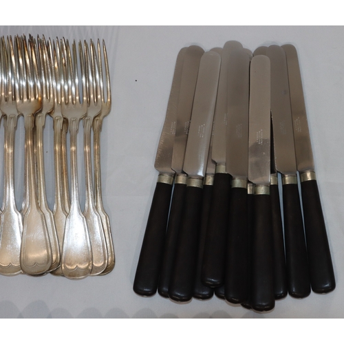 258 - A large Continental flatware service comprising of 30 forks, 29 spoons, 12 ebonised handled knives (... 