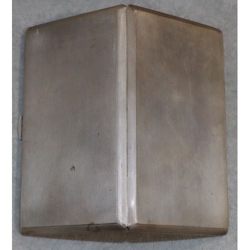 263 - A large London silver cigarette case with allover engine turned decoration and hinged front, 14cm lo... 