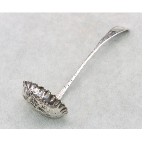 282 - A George IV Scottish silver sifter ladle with embossed fruit and leaf decoration and crinkled rim, E... 