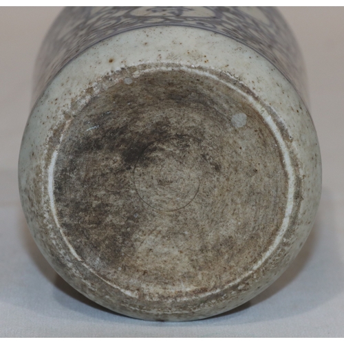 48 - An Oriental cylindrical brush pot on blue and white ground with scroll and inscription decoration, 1... 