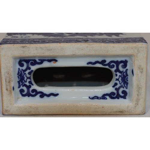 56 - An Oriental blue and white rectangular shaped pillow with animal, floral, leaf and scroll decoration... 