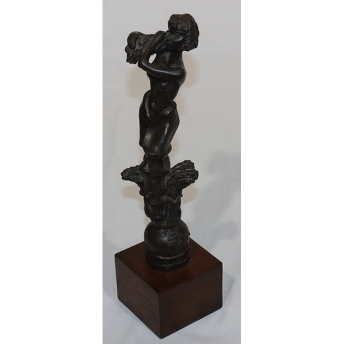 685 - Tom Greenshield, bronze resin statue of a part female nude carrying a bundle of wheat standing upon ... 