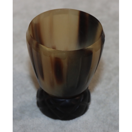 698 - A horn round trumpet shaped shot glass, 5.5cm high