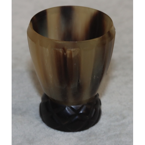 698 - A horn round trumpet shaped shot glass, 5.5cm high