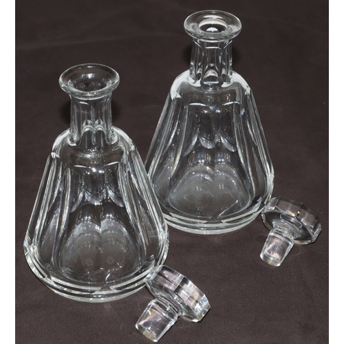 71 - A pair of Baccarat octagonal bulbous thin necked decanters with stoppers and chamfer decoration, 7 m... 