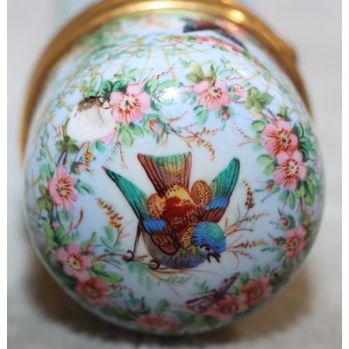 738 - S Morden & Co. enamelled cylindrical scent bottle with multi-coloured bird's nest inset floral and g... 