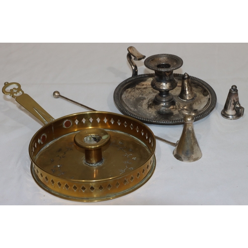 743 - A brass chamber candlestick with pierced gallery, a silver plated chamber candlestick with snuffer a... 