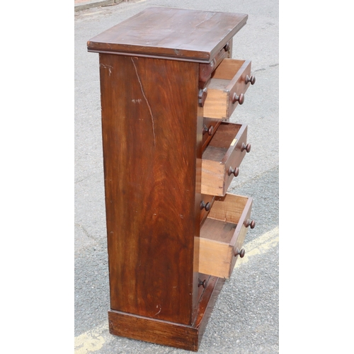 919 - A Victorian walnut Wellington chest with 7 graduated drawers with wood knob handles and lockable sid... 