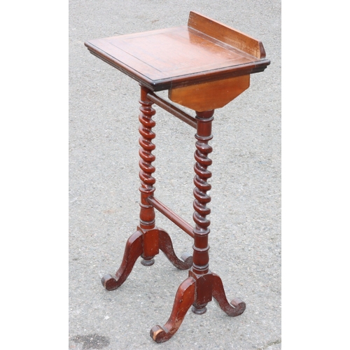 925 - A 19th Century rosewood reading table with hinged top, barley twist supports on splayed legs, 38.5cm... 