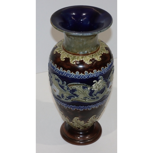 107 - A Royal Doulton glazed earthenware round bulbous thin necked trumpet shaped vase on brown, blue and ... 