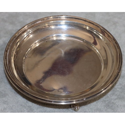 188 - A Birmingham silver small round wine coaster on splayed claw feet, 10cm diameter, 2.3oz