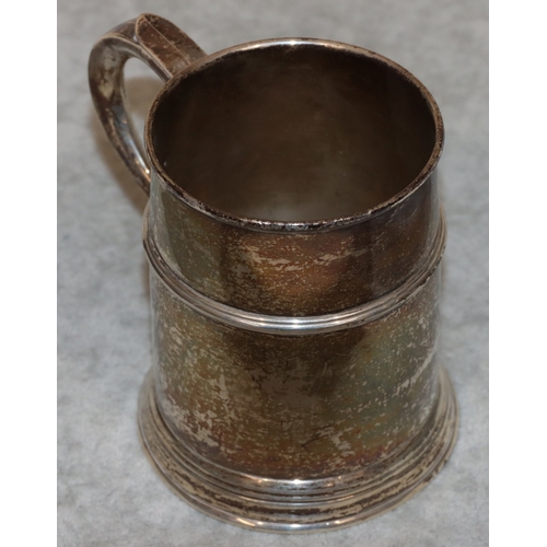 192 - A London silver christening mug with scroll handle, engraved presentation, 10cm high, 7.3oz