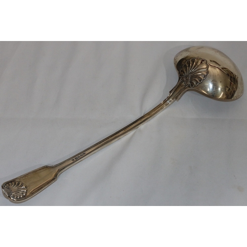 202 - A William IV silver soup ladle with engraved crest, 10.9oz