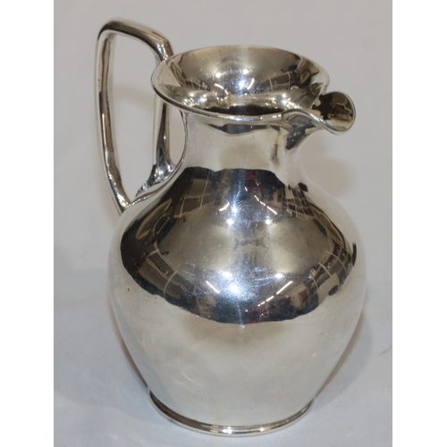 214 - An early Victorian silver round bulbous shaped milk jug, London 1844, maker's mark AA/JA, 12cm high,... 