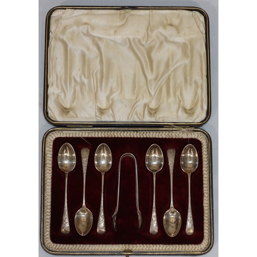 265 - A set of 6 Sheffield silver spoons with a pair of matching sugar tongs engraved with leaf decoration... 