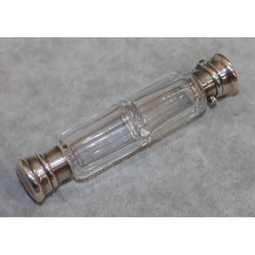 274 - A cut glass double-ended scent bottle with screw end (no inner stopper) and hinged end (slight damag... 