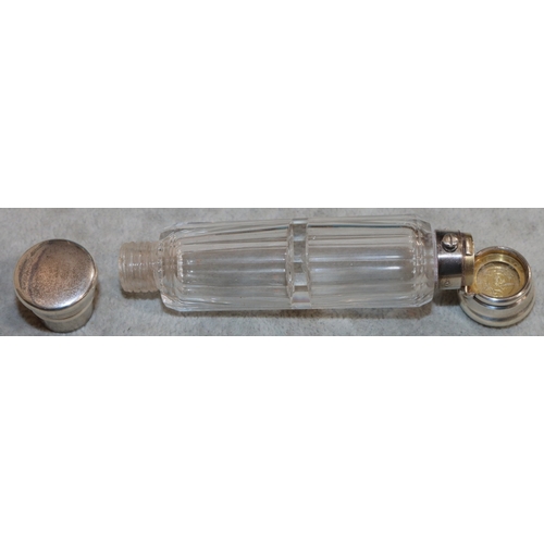 274 - A cut glass double-ended scent bottle with screw end (no inner stopper) and hinged end (slight damag... 