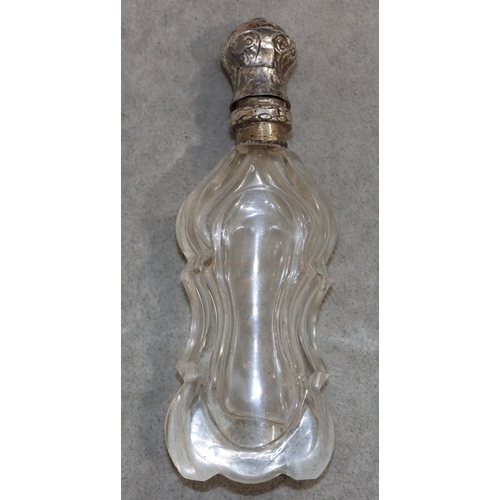 275 - A cut glass crystal rectangular scallop shaped bottle with silver coloured metal hinged lid (no inne... 