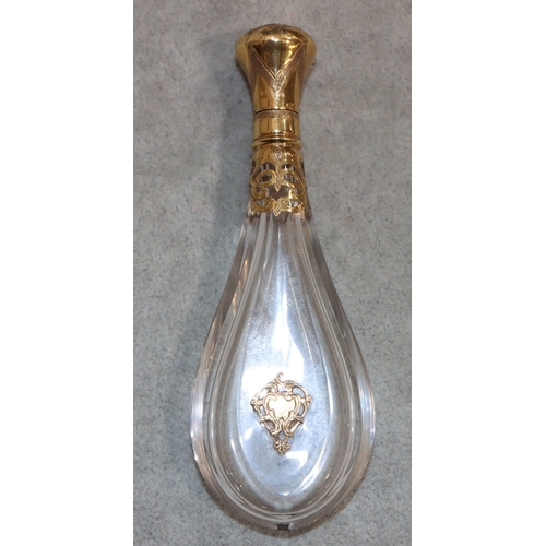 277 - A Continental crystal pear shaped flat scent bottle with silver gilt neck and hinged lid (no inner s... 