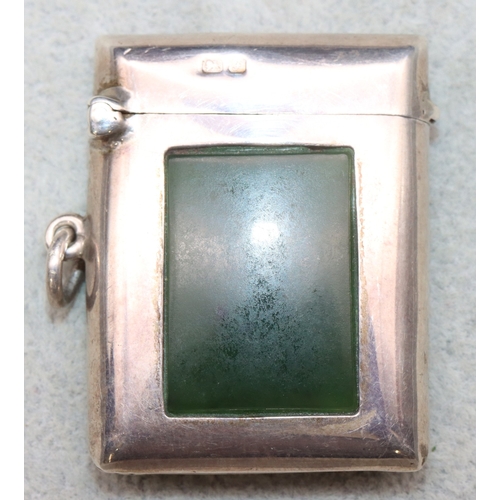 283 - An Edward VII silver vesta case inset with rectangular jade panel, Chester 1906, maker's mark C&S, o... 