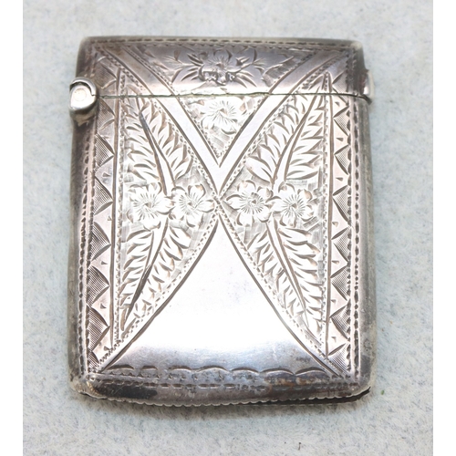 285 - An Edward VII silver vesta case with chased floral and leaf decoration, Birmingham 1901, maker Arthu... 