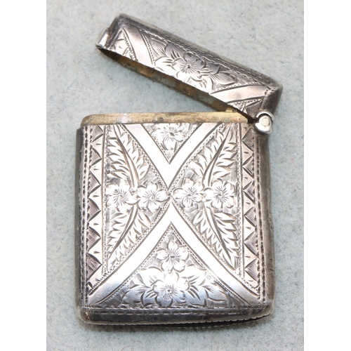 285 - An Edward VII silver vesta case with chased floral and leaf decoration, Birmingham 1901, maker Arthu... 