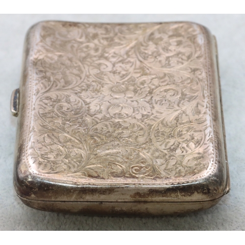 286 - A concave shaped cigarette case with allover chased floral and scroll decoration and hinged front, B... 