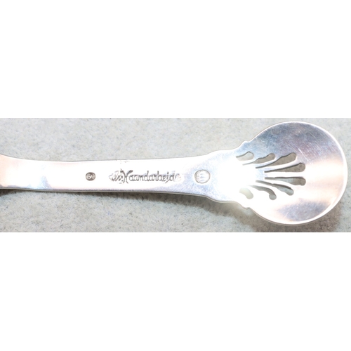 287 - A Danish Art Nouveau style caddy spoon with pierced and raised floral handle, circa 1948, 0.75oz