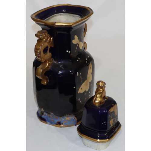 31 - A large 19th Century bulbous thin necked trumpet shaped 2-handled lidded vase on royal blue ground a... 