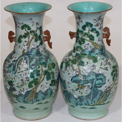 32 - A pair of 19th/20th Century Chinese round bulbous thin necked trumpet shaped 2-handled vases with mu... 