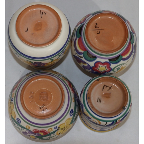 45 - 4 various Poole round bulbous shaped vases with multi-coloured floral, leaf and scroll decoration, l... 