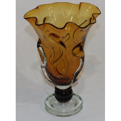 59 - An amber and clear glass round handkerchief vase with raised scroll decoration, 29cm high