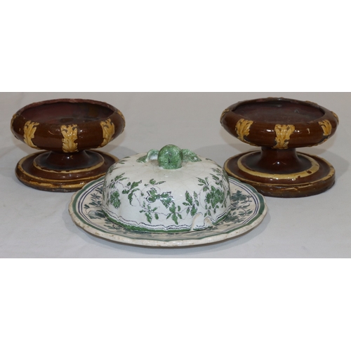 67 - A pair of Yorkshire Ware round bulbous shaped pot stands with leaf decoration, on sweeping bases, 16... 