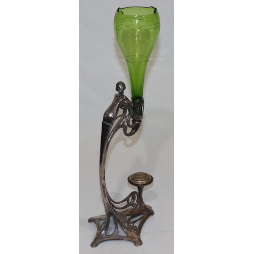 689 - An Art Nouveau green glass round bulbous shaped vase, on stand in the form of a lady entwined with r... 