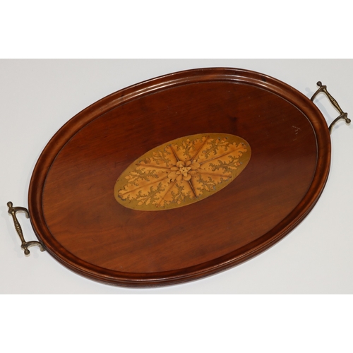 691 - An Edwardian mahogany oval tray with brass handles, inlaid marquetry centre with acorn and leaf deco... 