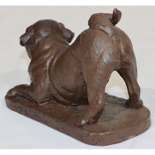 692 - A bronze resin figure of a pug on rectangular shaped base, 12cm high